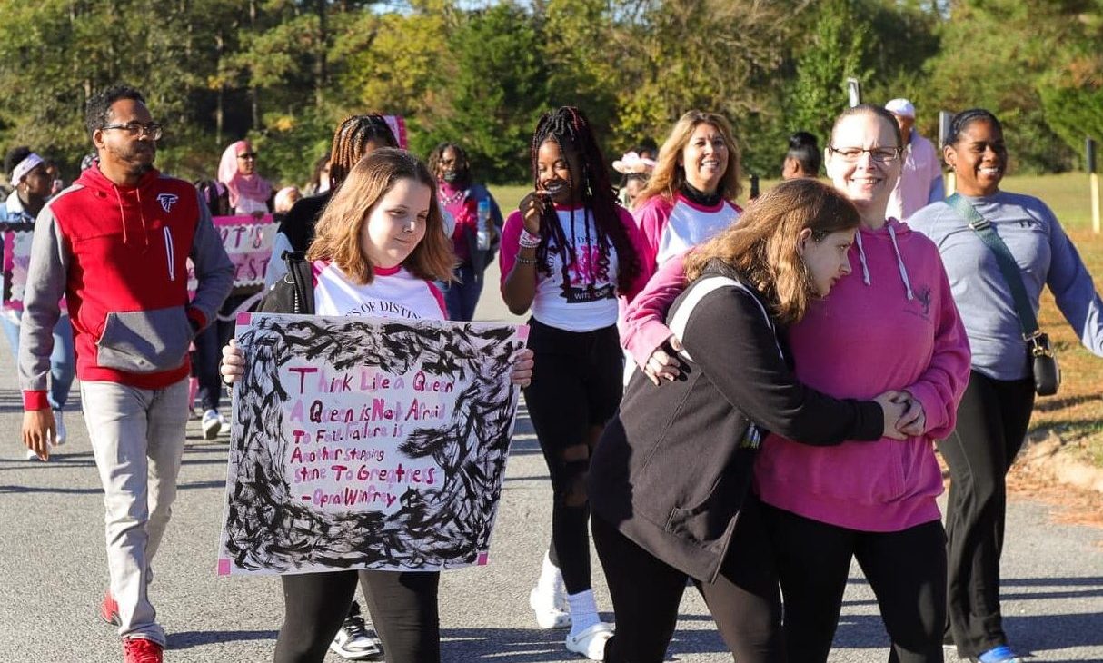 Gala guests in pink and black